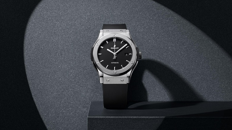 Picture of Hublot Classic Fusion on stand with shadows.