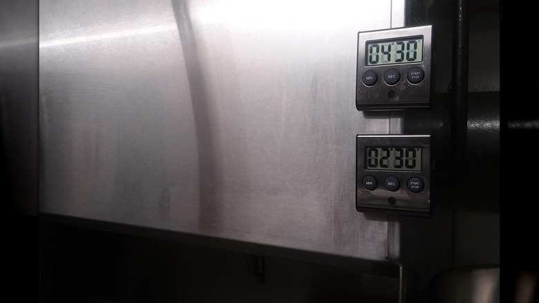 Close up of timer on side of fridge