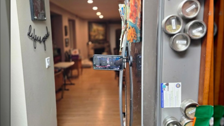 Shot of phone mounted on a fridge