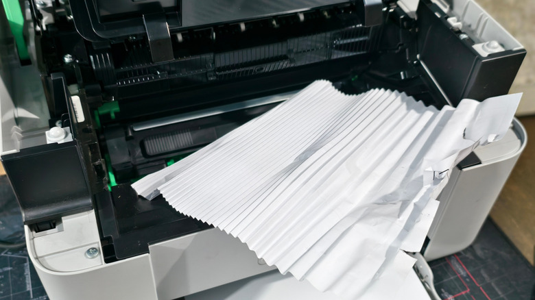 Close up of serious printer paper jam.
