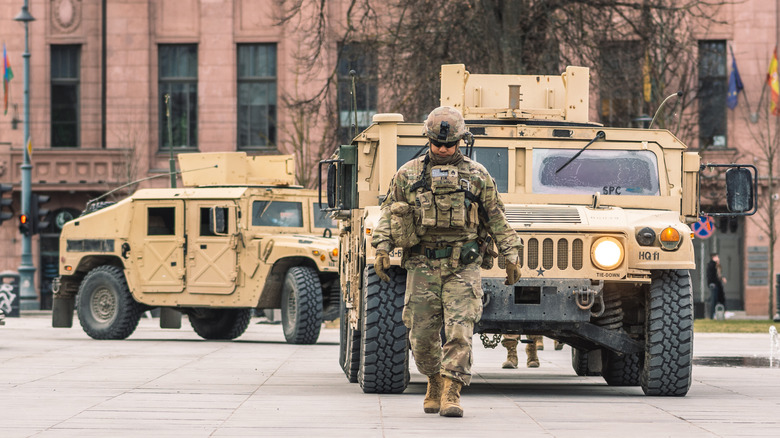 HMMWVs in convoy transit through an American City