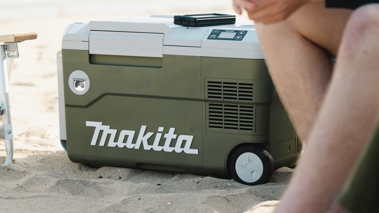 The Makita cooler/warmer on a beach.