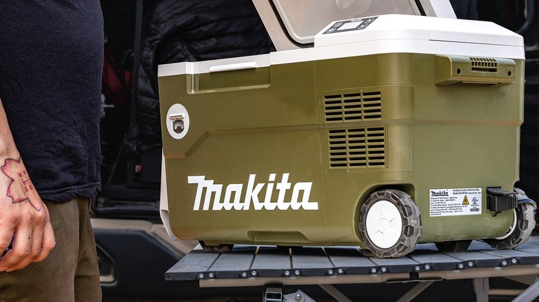 The Makita cooler/warmer on a pop up camping table.