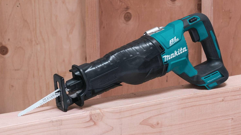 The Makita LXT Brushless Recipro Saw resting on wood.