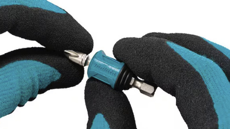 Makita mag boost in gloved hands