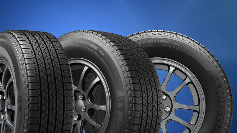 A trio of Michelin Latitude Tour tires at different angles