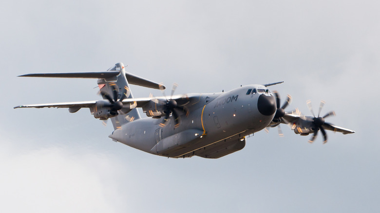 Airbus A400M heavy airlifter plane seen from below front left flying at ILA Berlin Air Show 2012