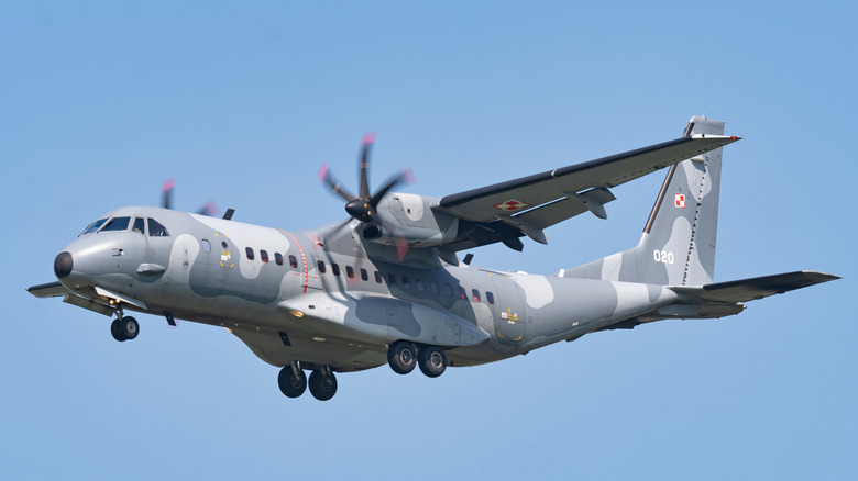 C-295 aircraft of the Polish Air Force seen from below left with landing gear extended