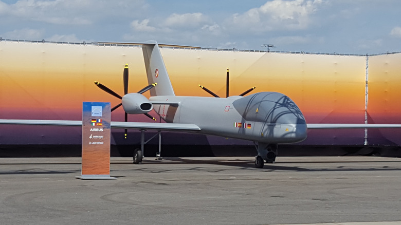 Eurodrone MALE RPAS drone aircraft seen from front left parked at a show