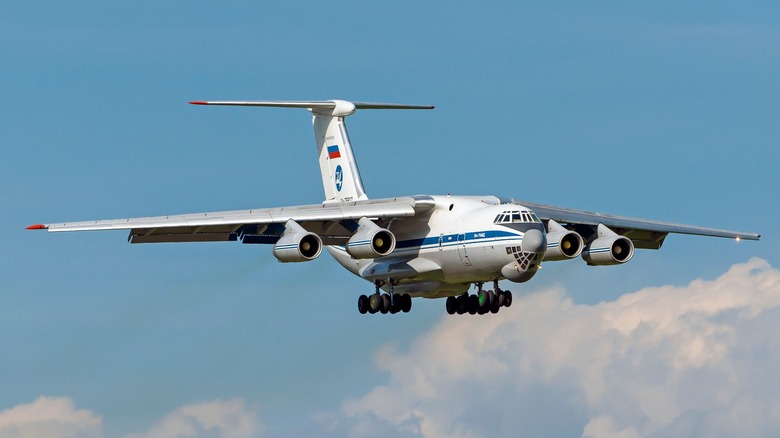 Ilyushin Il-76 fling over clouds