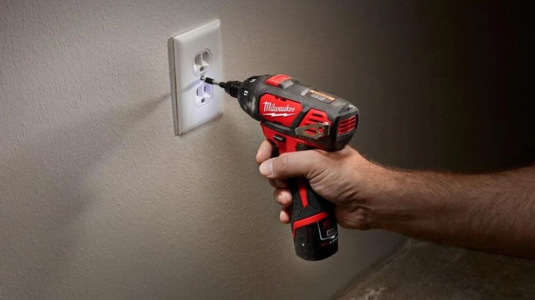Man using Milwaukee 12V Cordless Screwdriver