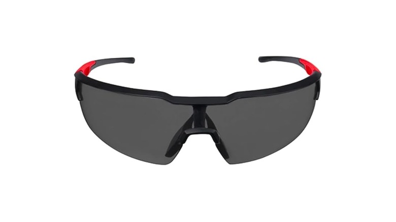 Safety glasses with tint over a white background