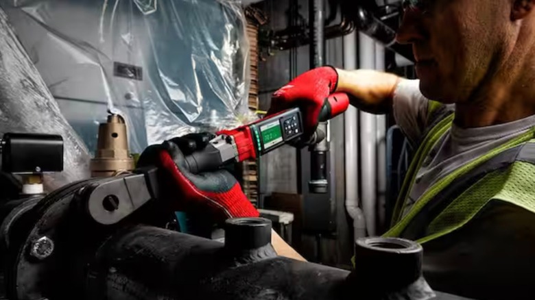 Milwaukee M12 Fuel ½-inch Digital Torque Wrench in use