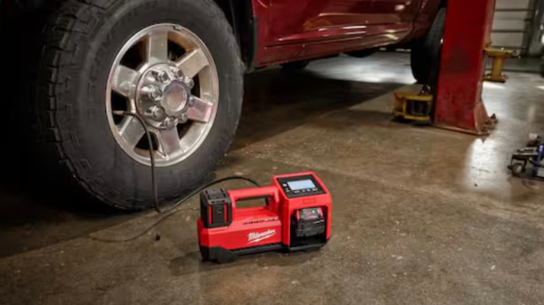 Milwaukee M18 Cordless Tire Inflator in use