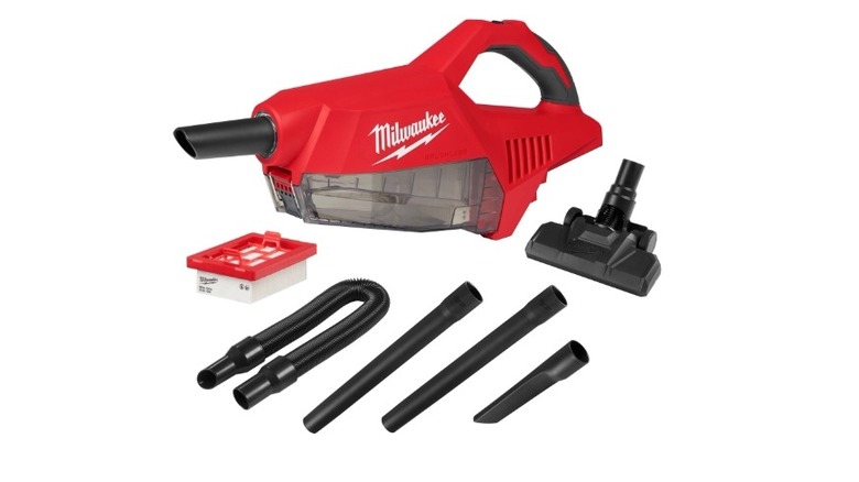 Stock photo of a Milwaukee Tool handheld vacuum cleaner with attachments