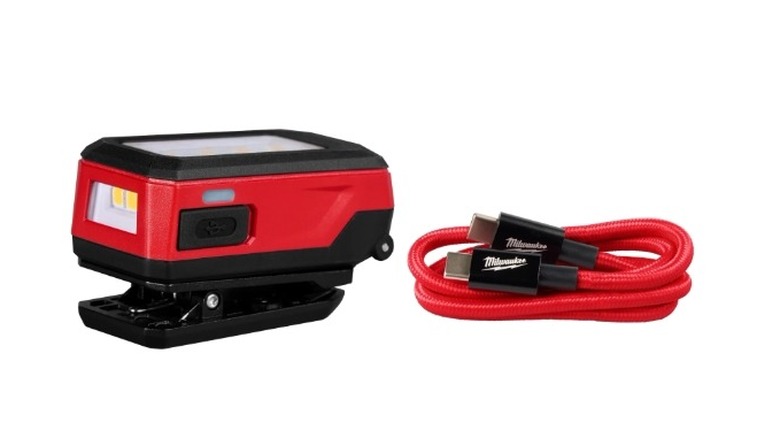 Stock photo of a Milwaukee Tool clip-on light with charging cable