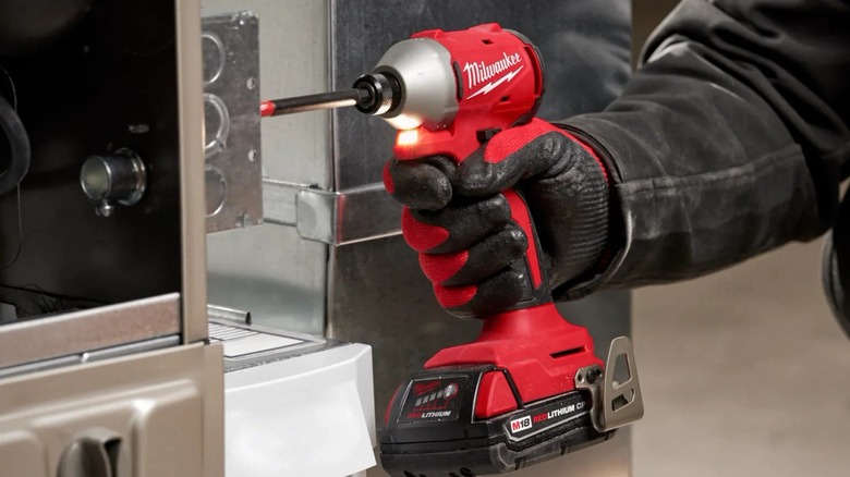 M18 Compact ¼-inch Hex Impact Driver in use