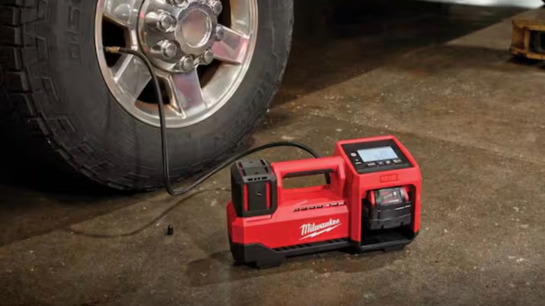 Milwaukee M18 Cordless Inflator in use