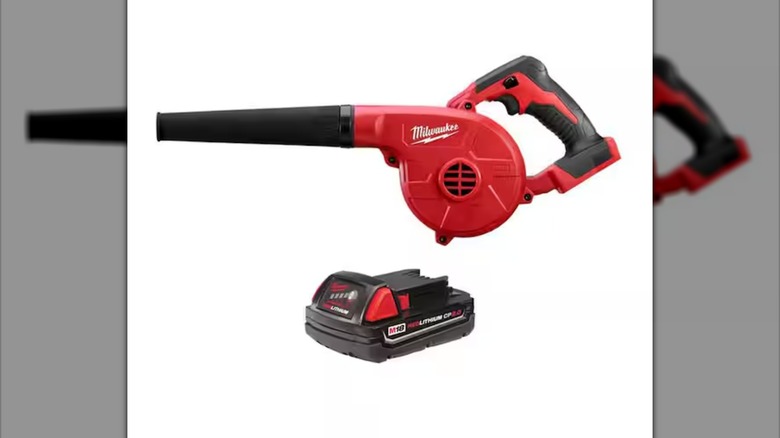 A Milwaukee Compact Blower and battery pack against a white background.