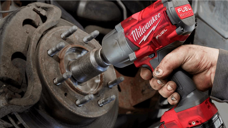 milwaukee tool being used on a car