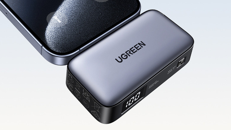 UGREEN mini power bank connected to iPhone