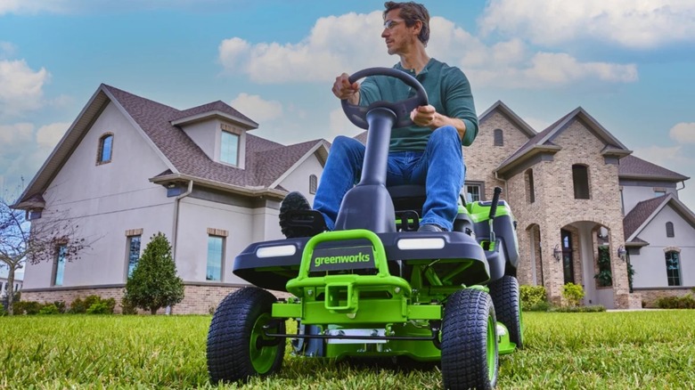 Greenworks 60V 30-inch CrossoverT Riding Lawn Tractor in use