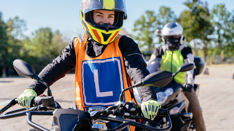 a learner on a motorcycle in class
