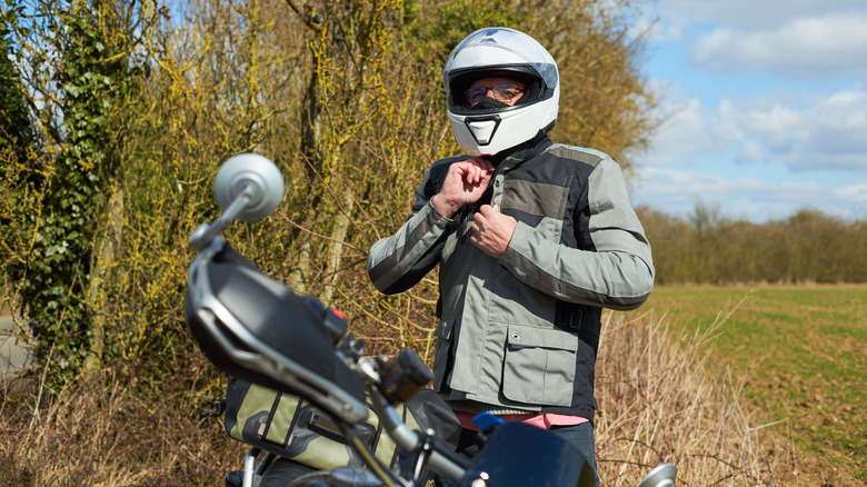 a motorcyclist wearing a helmet