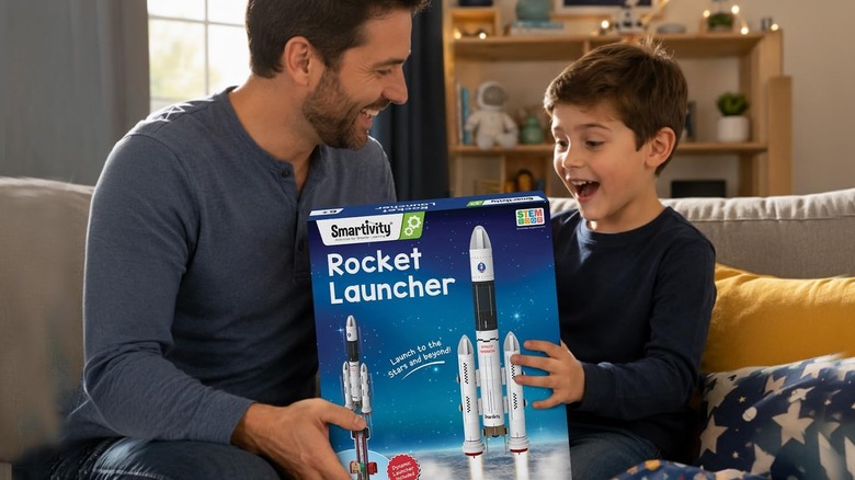 Father and son with Smartivity rocket launcher kit