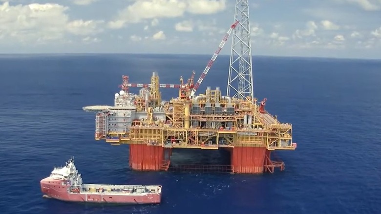 Ichthys CPF with a support vessel alongside