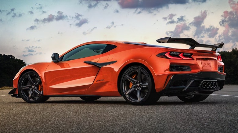 A Chevrolet Corvette Z06 in orange at dusk