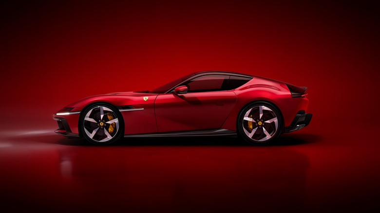A Ferrari 12Cilndri in red from the side with red background