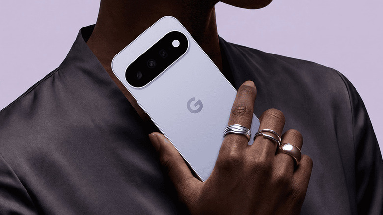 A person holding the Google Pixel 11