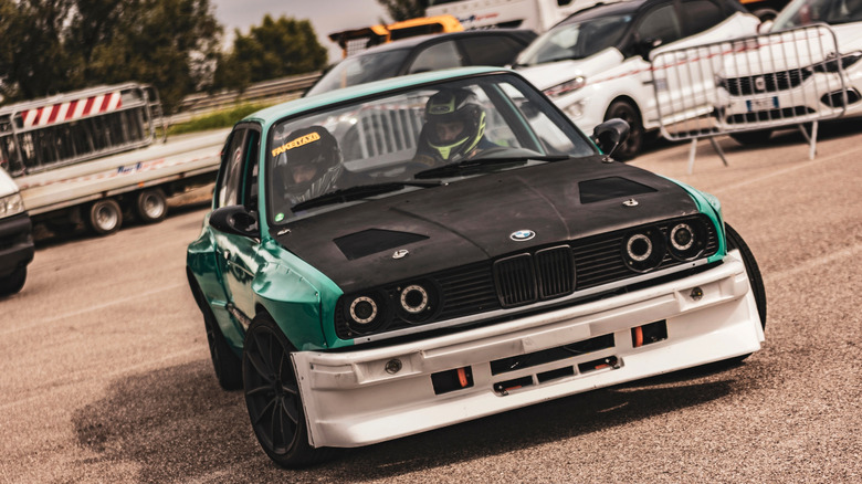 E30 BMW with bolt-on wide body kit