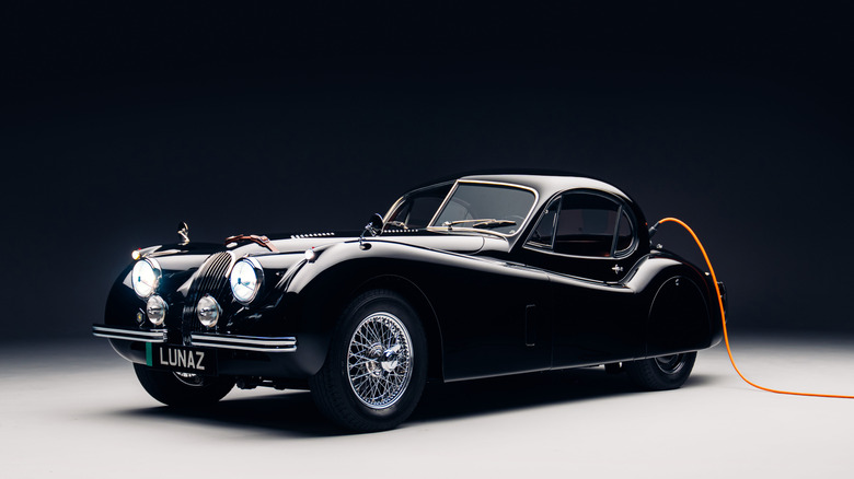 Electric Jaguar XK120 being charged