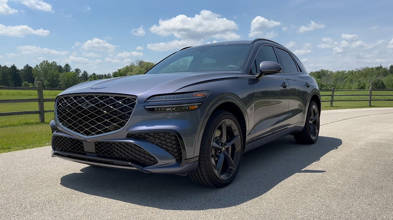 A gray 2026 Genesis GV70 parked