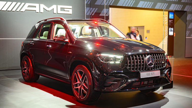 Black Mercedes-AMG GLE SUV seen from right front on display in an auto show