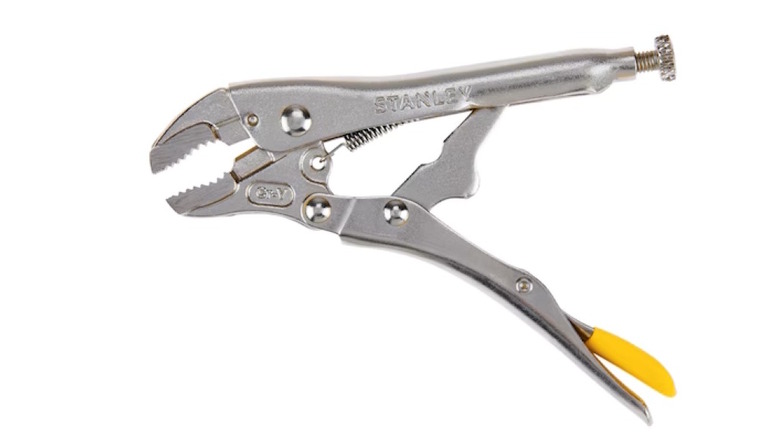 Adjustable locking pliers on white background