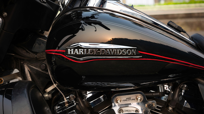 Black and red Harley-Davidson motorcycle exterior with logo at center