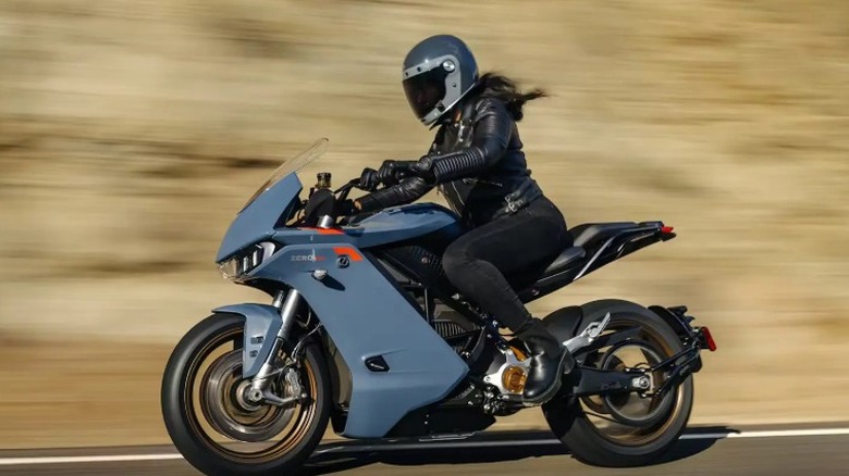 A woman riding a Zero SR/S