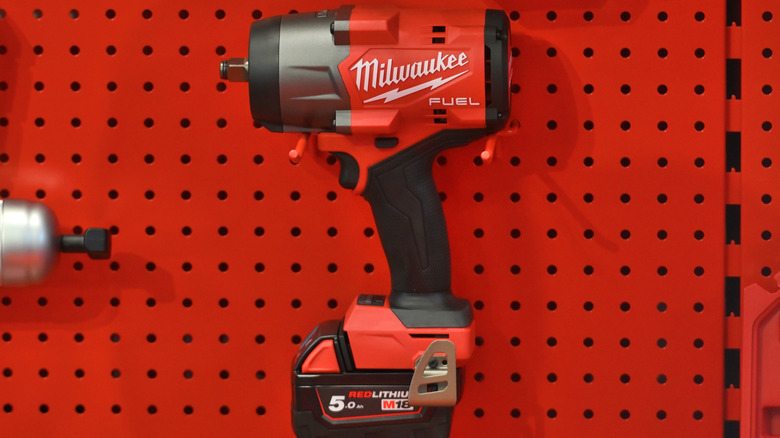 Milwaukee power tools with red wall