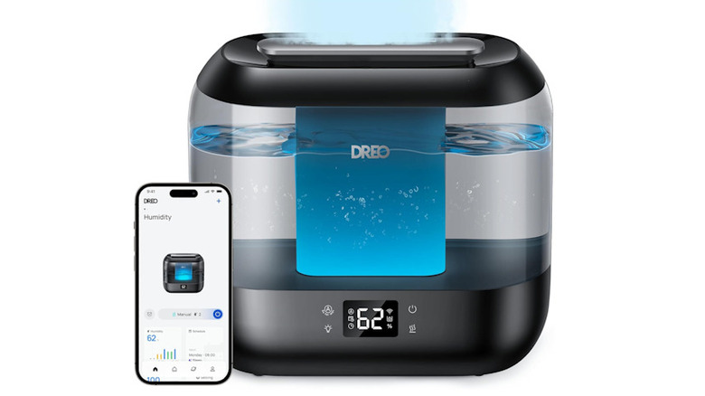 Dreo Smart Humidifier next to smartphone with application on it, on a white background