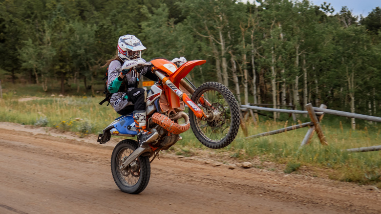 KTM dirt bike doing wheelie