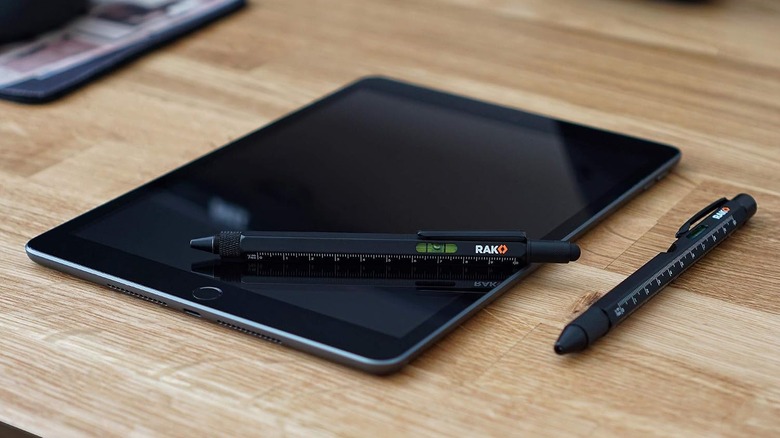 pen multitool on top of tablet