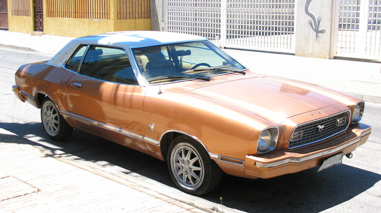 1974 Ford Mustang II parked on street, front-right 3/4 view