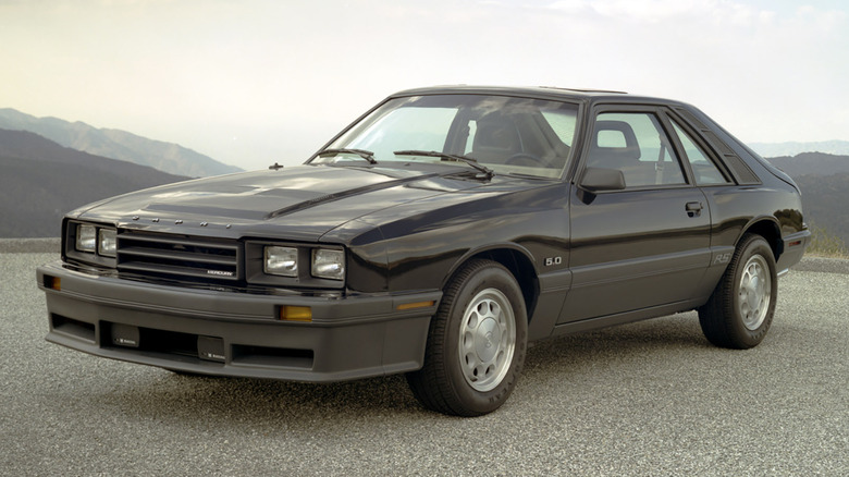 Front 3/4 view of black Fox Body Mercury Capri 5.0.