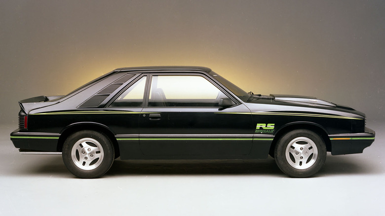 Side view of black Mercury Capri RS in studio.