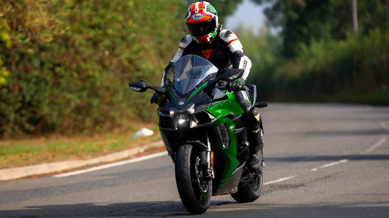 person riding kawasaki ninja