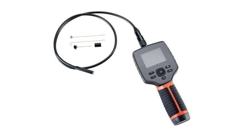 The Ames Instruments Digital Inspection Camera with accessories and a cable on a white background