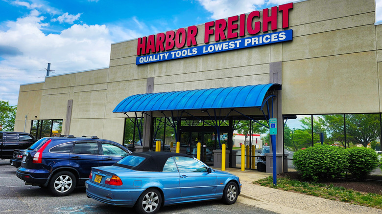 The front wall of a Harbor Freight store, cars parked outside